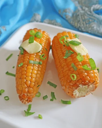Fresh corn on the cob cooked perfectly in an air fryer