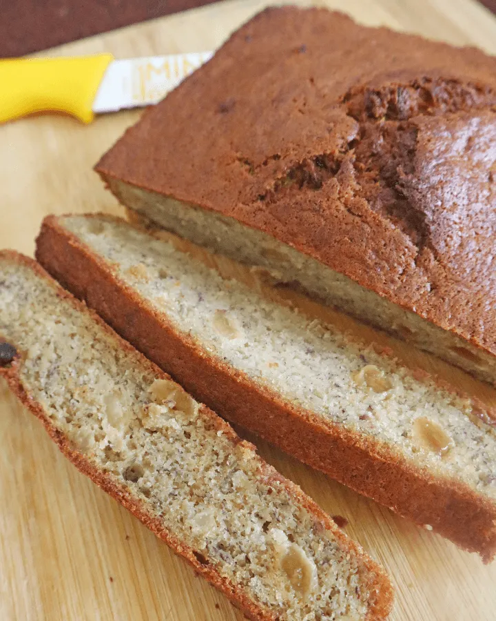 A sliced loaf of moist air fryer banana bread