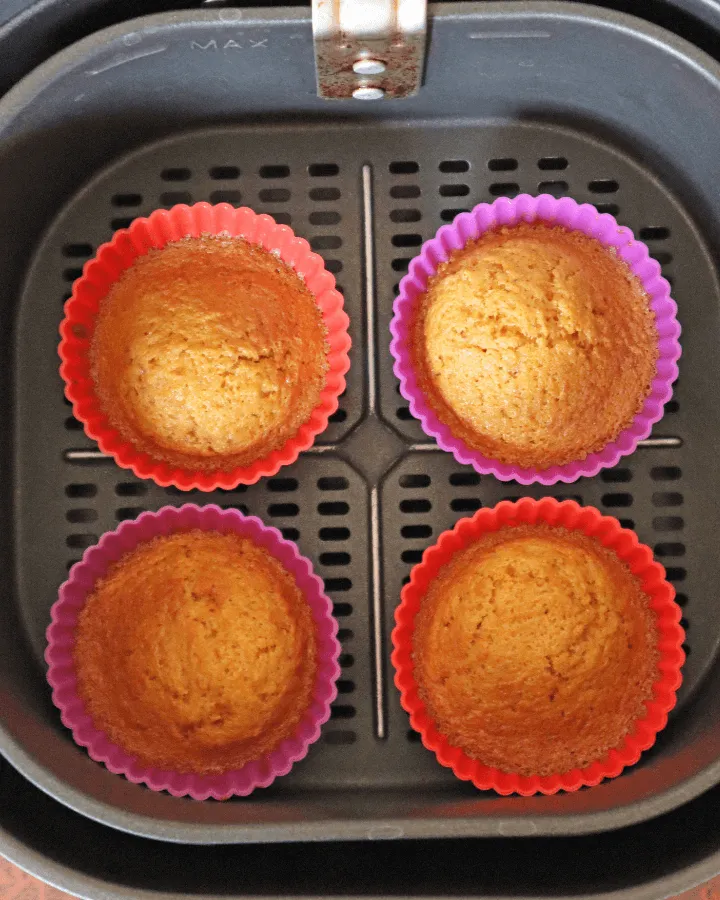 Toothpick test checking a baked carrot muffin for doneness