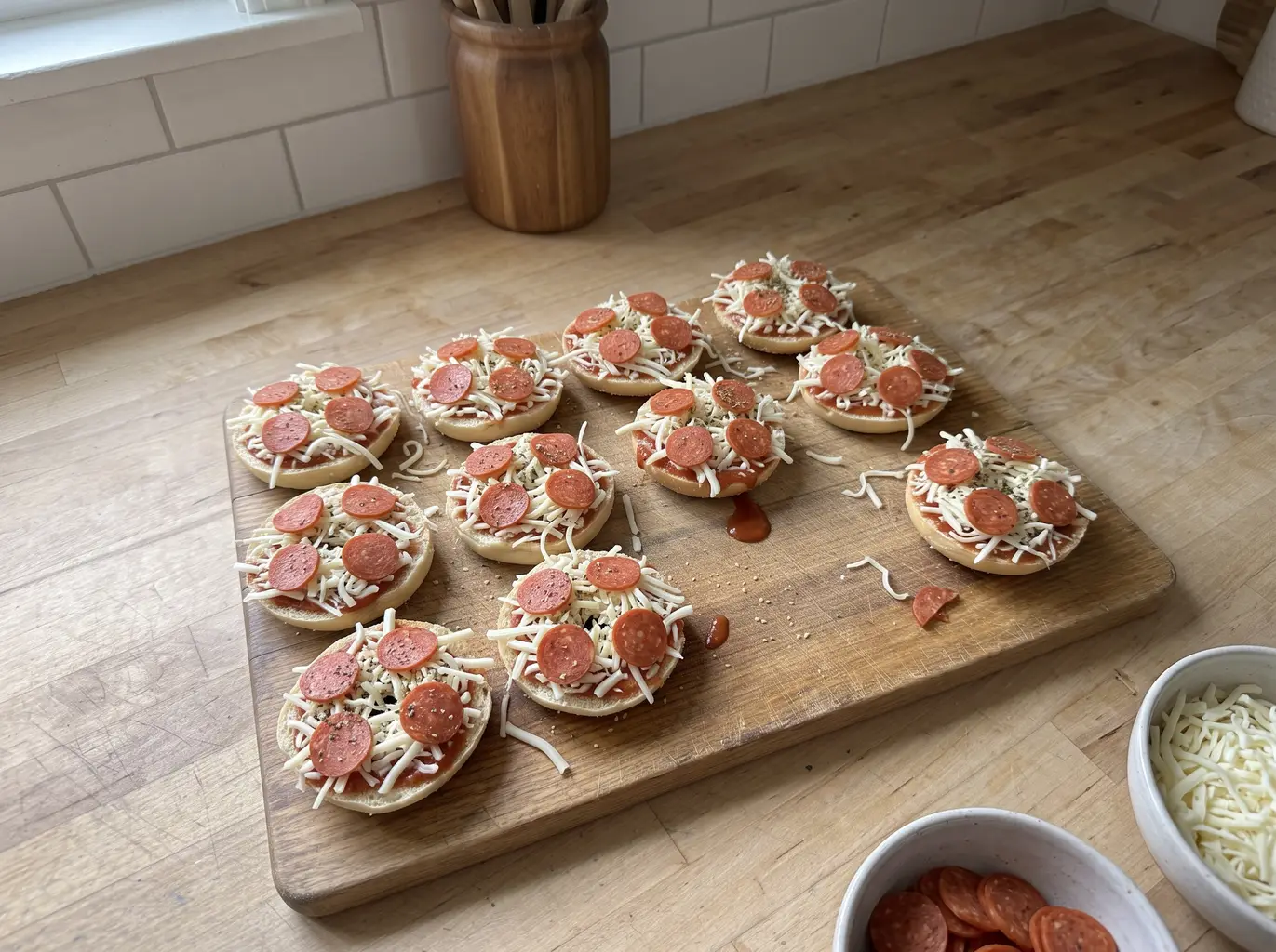 Homemade bagel bites topped with cheese