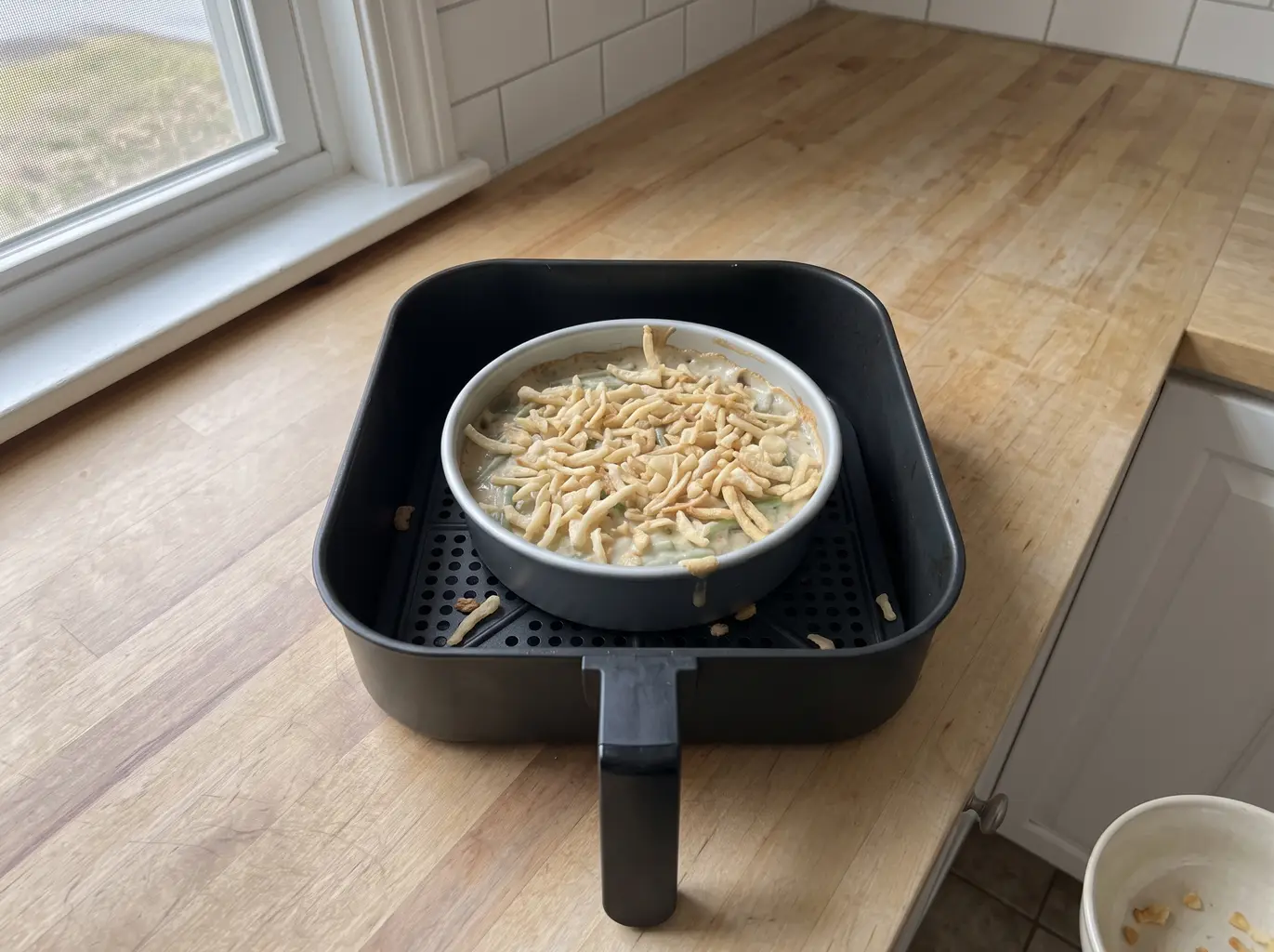 Crispy fried onions scattered over the top to toast